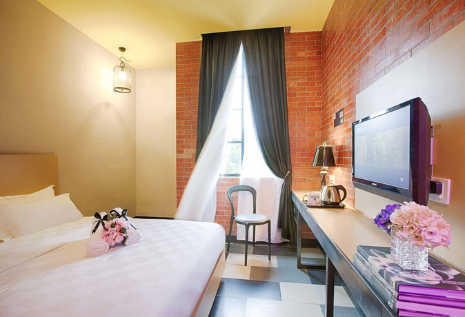 Imagen de la habitación del Hotel The Youniq. Foto 13