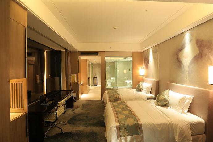 Imagen de la habitación del Hotel The Yun Hankou. Foto 4