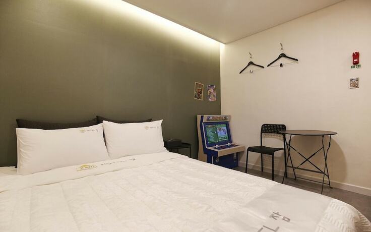 Imagen de la habitación del Hotel The Zam. Foto 7