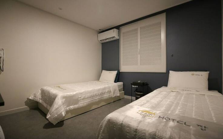 Imagen de la habitación del Hotel The Zam. Foto 8