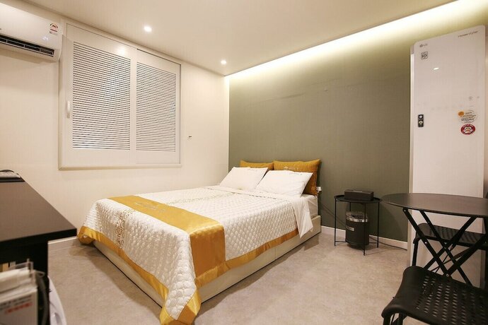 Imagen de la habitación del Hotel The Zam. Foto 9