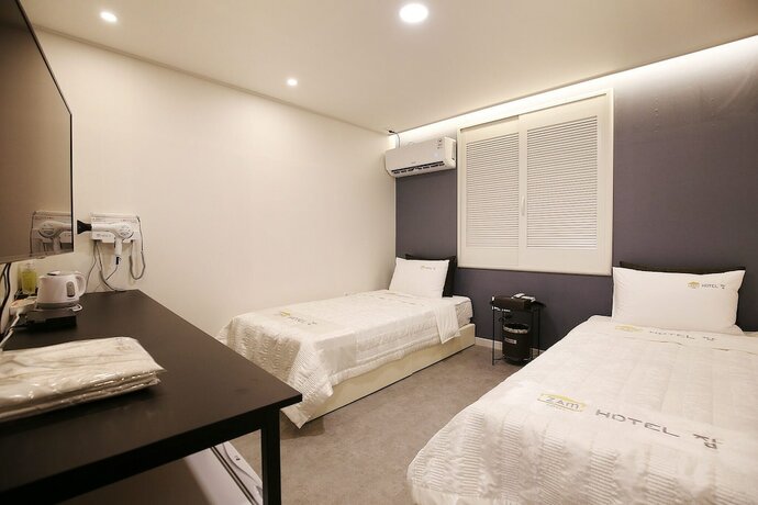 Imagen de la habitación del Hotel The Zam. Foto 11