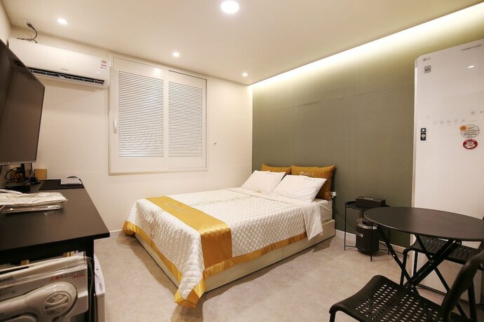 Imagen de la habitación del Hotel The Zam. Foto 12