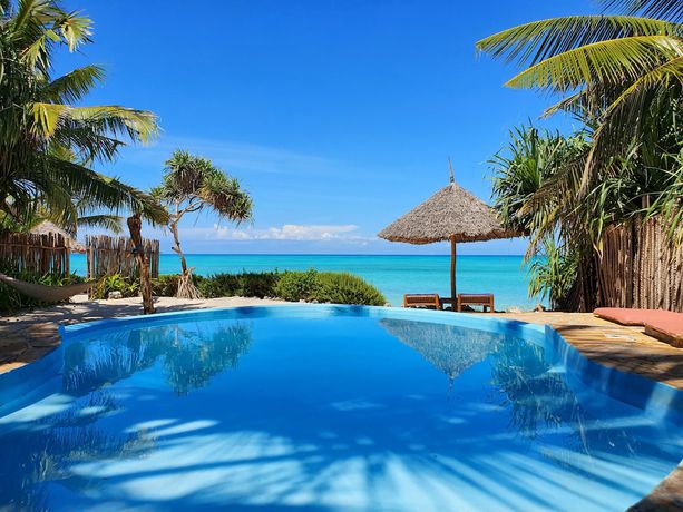 Imagen de la habitación del Hotel The Zanzibari. Foto 16