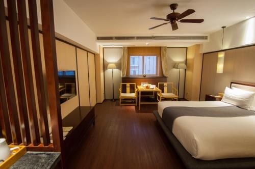 Imagen de la habitación del Hotel The Zen Urban Resort. Foto 4