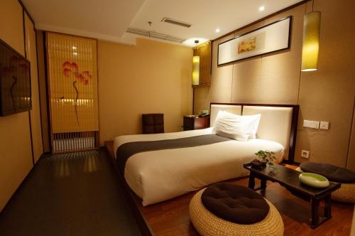 Imagen de la habitación del Hotel The Zen Urban Resort. Foto 7