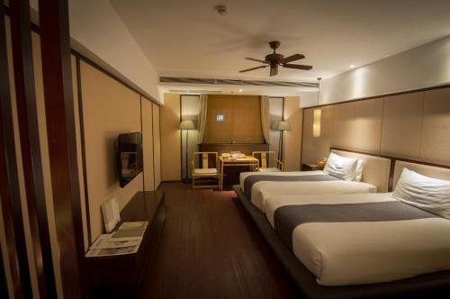 Imagen de la habitación del Hotel The Zen Urban Resort. Foto 8