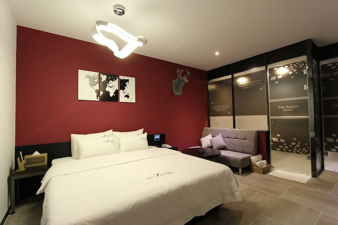 Imagen de la habitación del Hotel The Zenith. Foto 2