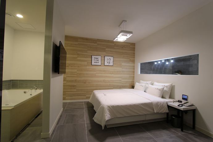 Imagen de la habitación del Hotel The Zenith. Foto 4