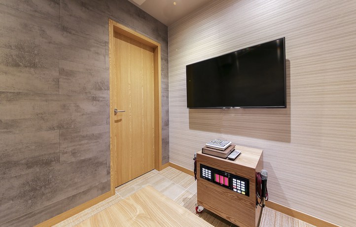 Imagen de la habitación del Hotel The Zenith. Foto 10