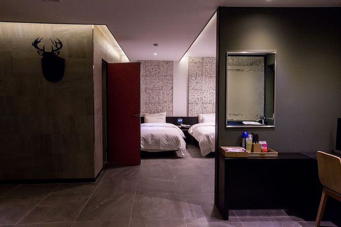 Imagen de la habitación del Hotel The Zenith. Foto 15