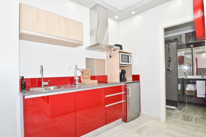 Imagen de la habitación del Hotel The Zentral Arenal Suites. Foto 3