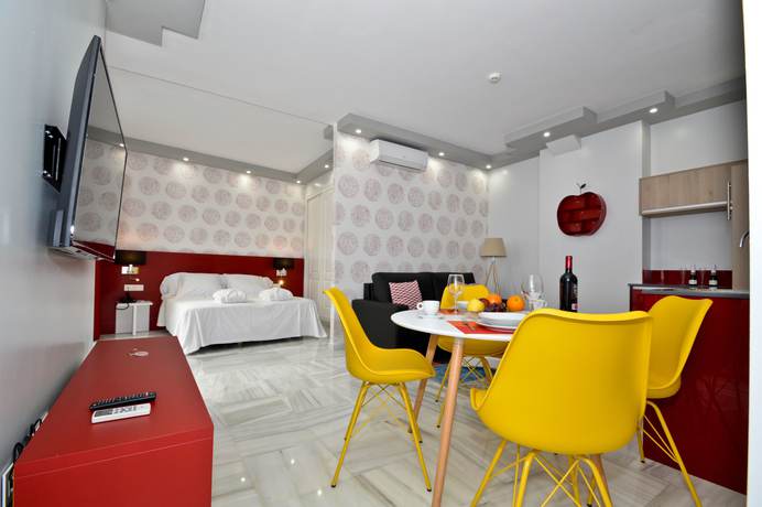 Imagen de la habitación del Hotel The Zentral Arenal Suites. Foto 12