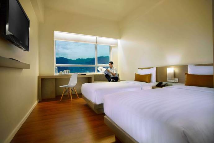 Imagen de la habitación del Hotel The Zhm Premiere Dh Grand Zuri Padang - Chse Certified. Foto 6