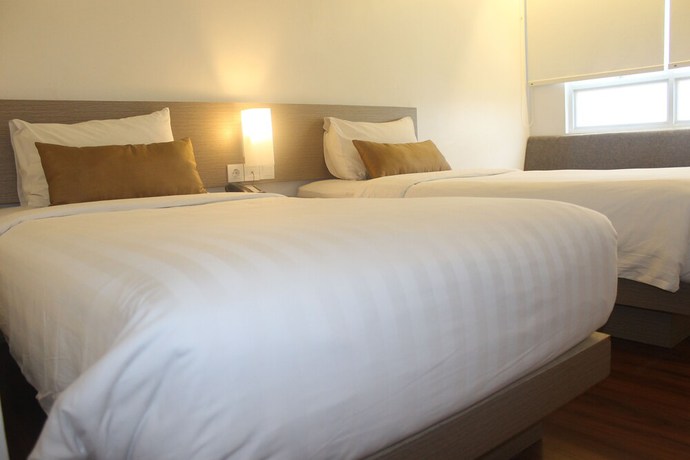 Imagen de la habitación del Hotel The Zhm Premiere Dh Grand Zuri Padang - Chse Certified. Foto 9