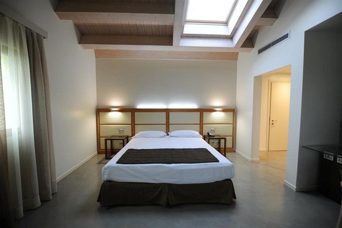 Imagen de la habitación del Hotel The Ziba and Spa. Foto 7