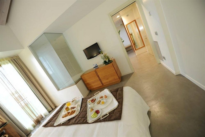 Imagen de la habitación del Hotel The Ziba and Spa. Foto 10