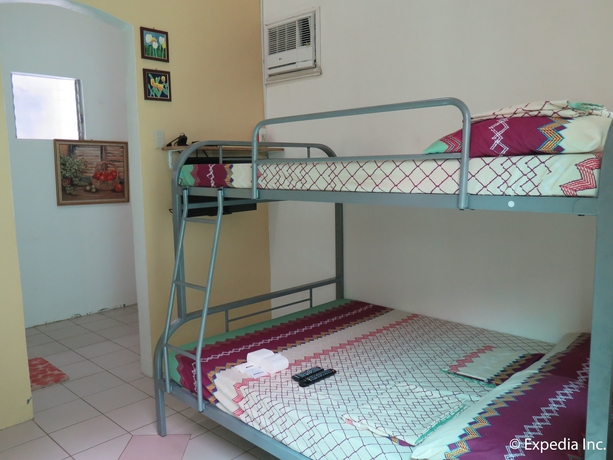Imagen de la habitación del Hotel The Zillion Builders Pavilion. Foto 4
