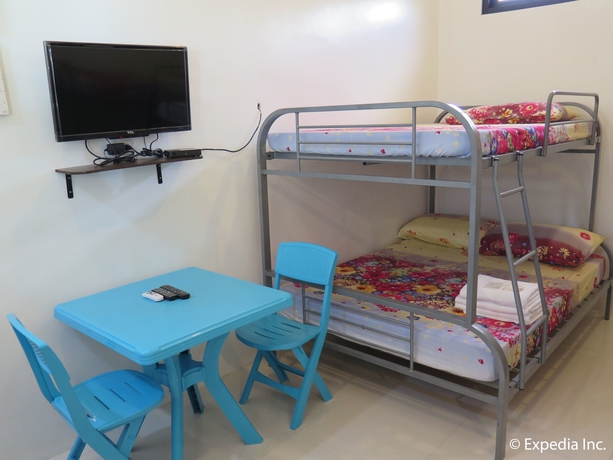Imagen de la habitación del Hotel The Zillion Builders Pavilion. Foto 8