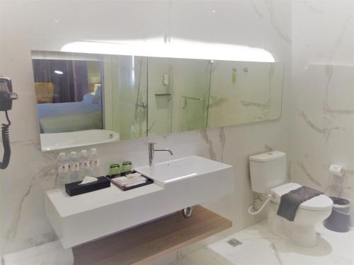 Imagen de la habitación del Hotel The Zuri Palembang. Foto 5