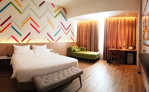 Imagen de la habitación del Hotel The Zuri Palembang. Foto 6