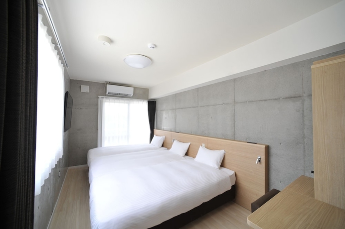 Imagen de la habitación del Hotel The breakfast Porto Ishigaki. Foto 5