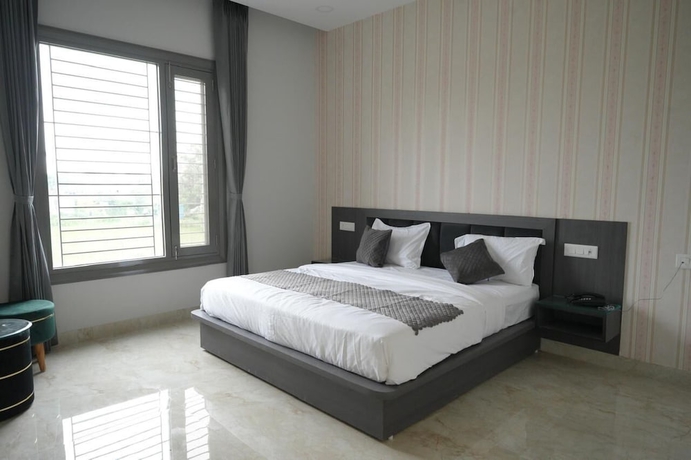 Imagen de la habitación del Hotel The carnation mound. Foto 2