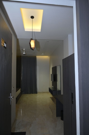Imagen de la habitación del Hotel The carnation mound. Foto 3
