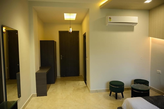 Imagen de la habitación del Hotel The carnation mound. Foto 5
