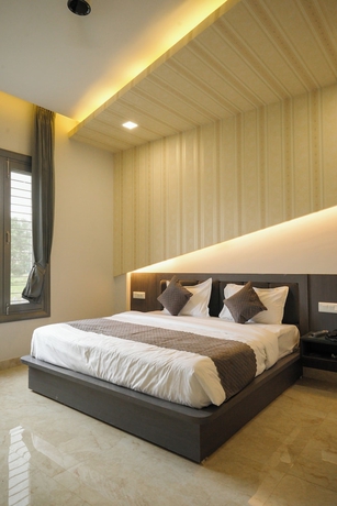 Imagen de la habitación del Hotel The carnation mound. Foto 6