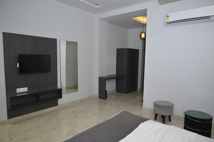 Imagen de la habitación del Hotel The carnation mound. Foto 8