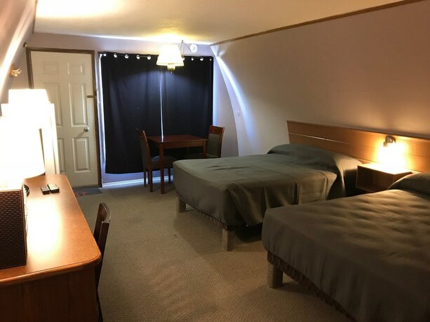 Imagen de la habitación del Hotel The little chalet motel. Foto 6