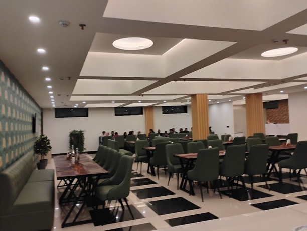 Imagen del bar/restaurante del Hotel The park green hotel and resort. Foto 6