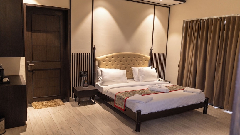 Imagen de la habitación del Hotel The premier gir resort. Foto 10