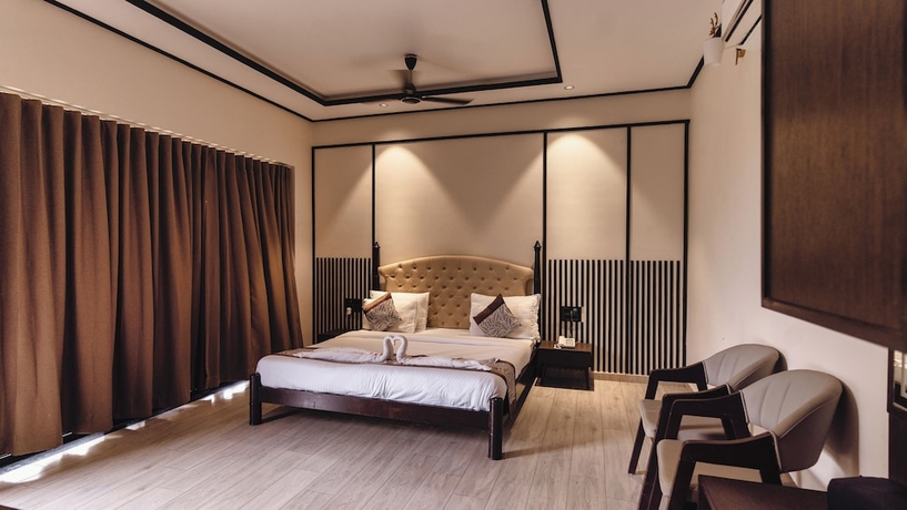 Imagen de la habitación del Hotel The premier gir resort. Foto 12