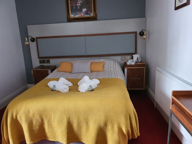 Imagen de la habitación del Hotel The royal oak hotel. Foto 2