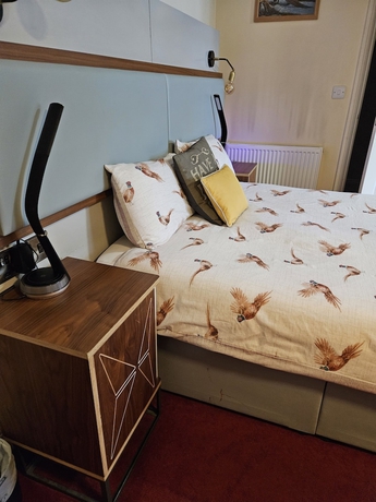 Imagen de la habitación del Hotel The royal oak hotel. Foto 4