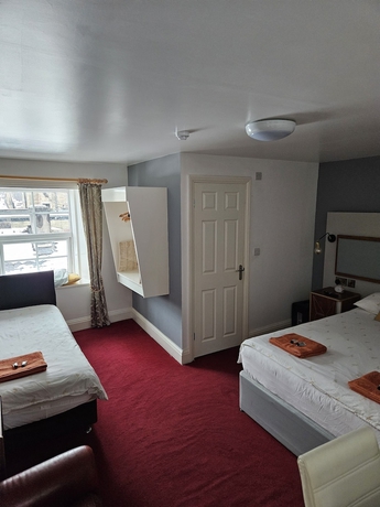 Imagen de la habitación del Hotel The royal oak hotel. Foto 5