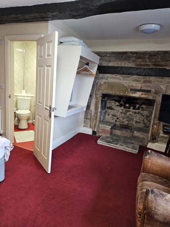 Imagen de la habitación del Hotel The royal oak hotel. Foto 8