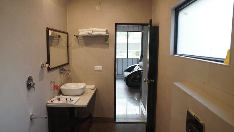 Imagen de la habitación del Hotel The shahanshahi. Foto 15
