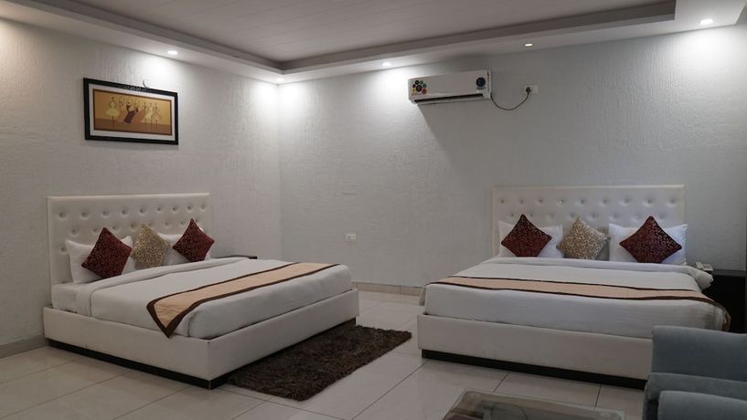 Imagen de la habitación del Hotel The shahanshahi. Foto 19