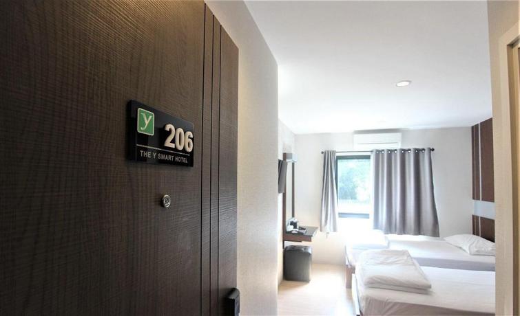 Imagen de la habitación del Hotel The y smart hotel. Foto 11