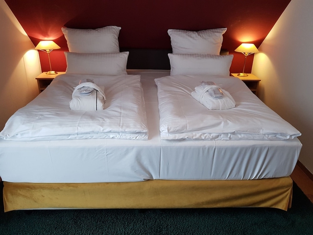 Imagen de la habitación del Hotel TheGreatNorth - HolstenTherme Resort. Foto 17