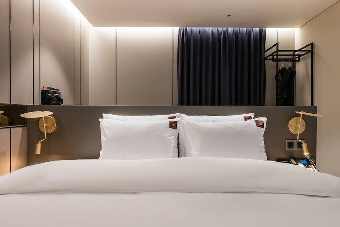 Imagen de la habitación del Hotel TheOne, Sacheon. Foto 11