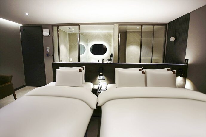 Imagen de la habitación del Hotel TheOne, Sacheon. Foto 12