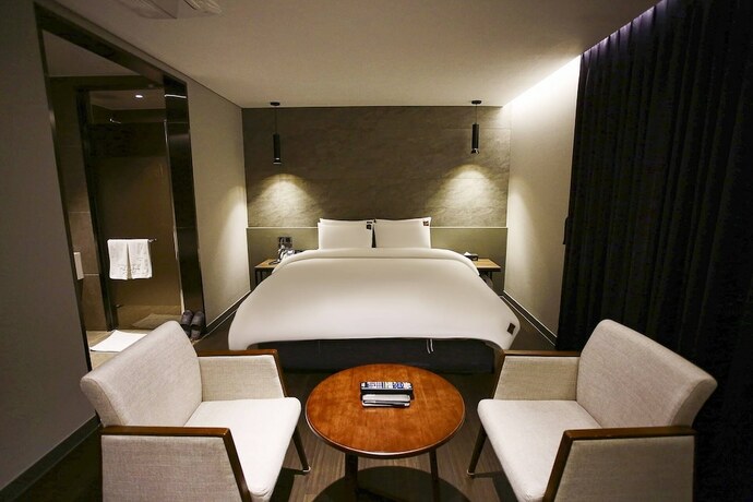 Imagen de la habitación del Hotel TheOne, Sacheon. Foto 18