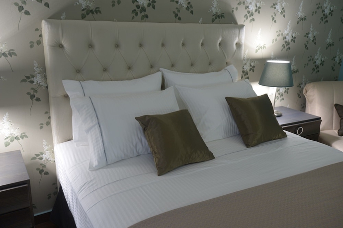 Imagen de la habitación del Hotel Theasis. Foto 5
