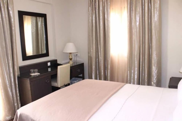 Imagen de la habitación del Hotel Theasis. Foto 15