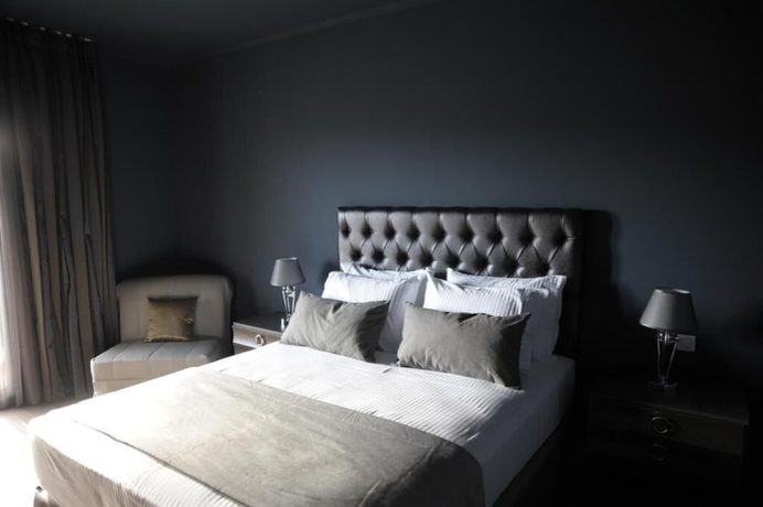 Imagen de la habitación del Hotel Theasis. Foto 16