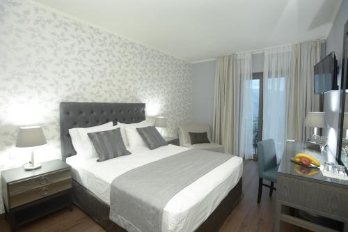 Imagen de la habitación del Hotel Theasis Paramythia. Foto 7